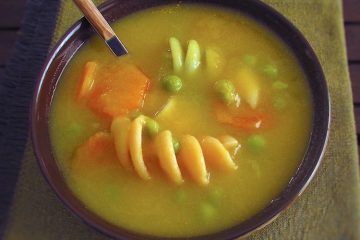 Colored soup on a soup bowl