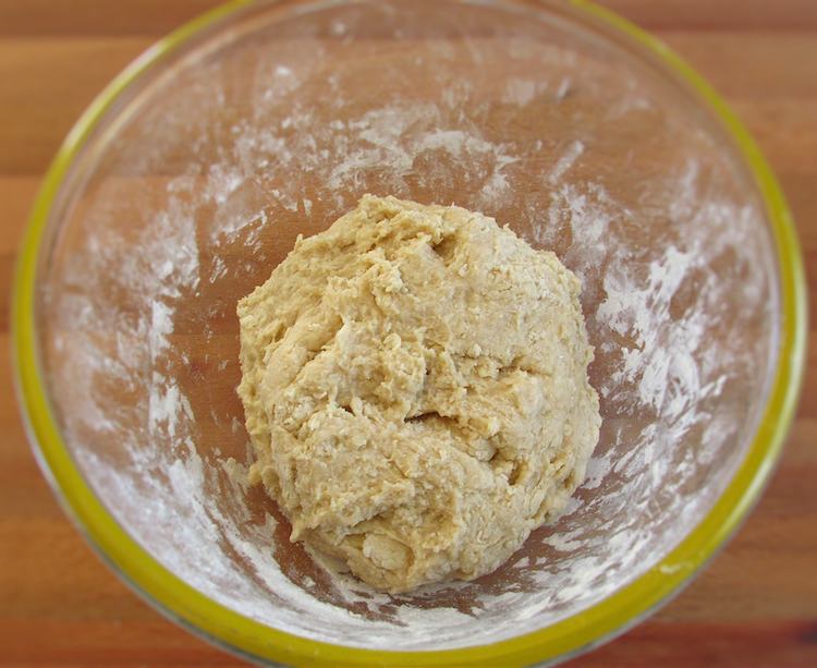 Milk bread dough kneaded on a glass bowl