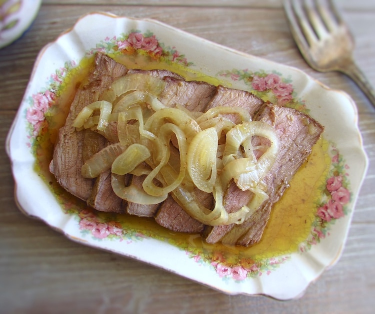 Slices of beef loin in the oven on a platter