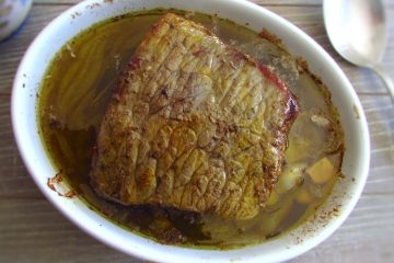 Baked beef loin on a baking dish