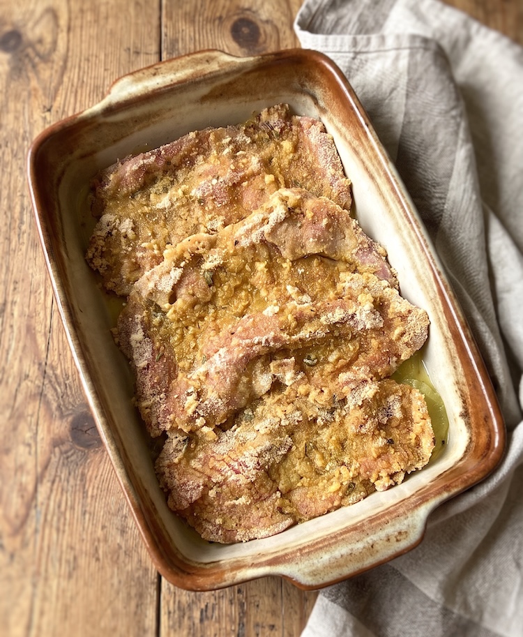 Breaded Pork Steaks on a baking dish