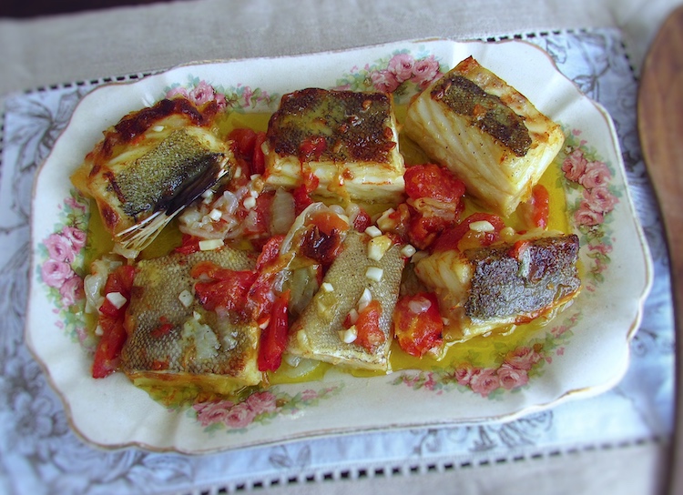 Simple cod in the oven served on a platter