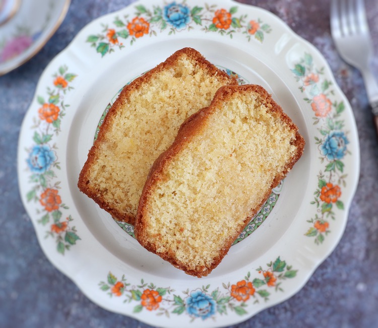 Soaked lemon cake slices on a plate