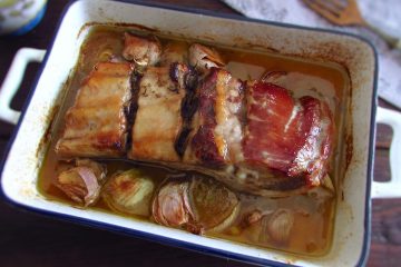 Oven baked pork ribs with honey on a baking dish