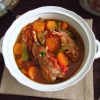 Rabbit stew with carrot on a tureen