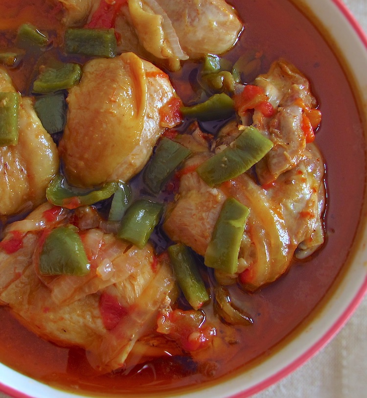 Chicken stew with peppers on a dish bowl