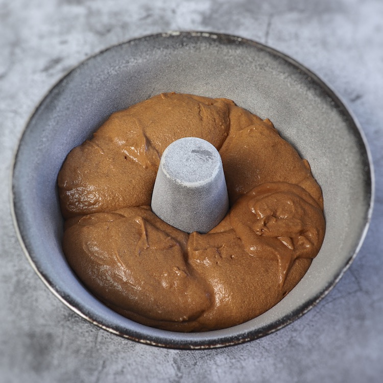 Coffee cake dough on a bundt cake pan