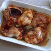 Roasted rabbit in the oven on a baking dish