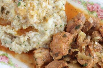 Portuguese migas with pork on a platter