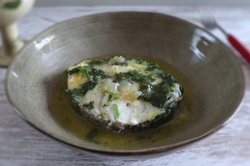 Stewed hake with lemon and coriander on a dish bowl