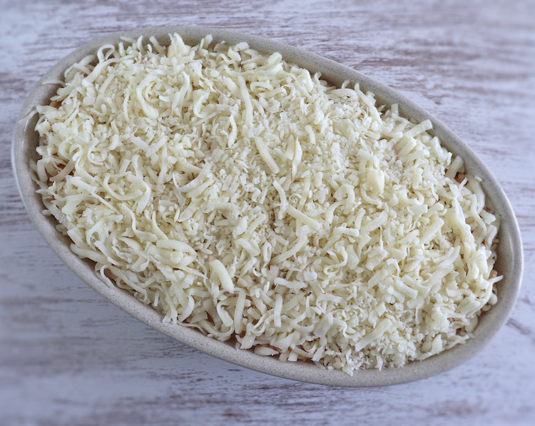 Spaghetti with meat and cheese on a baking dish