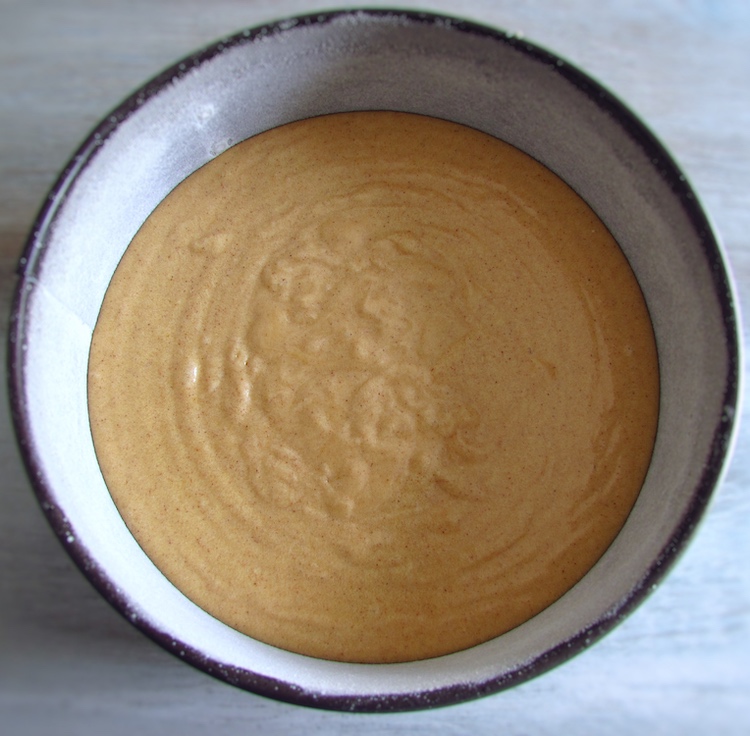 cake dough on a round cake pan