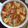 Chicken rice with peppers on dish bowl