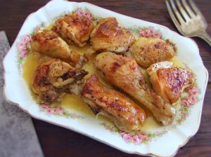 Baked chicken in the oven on a platter