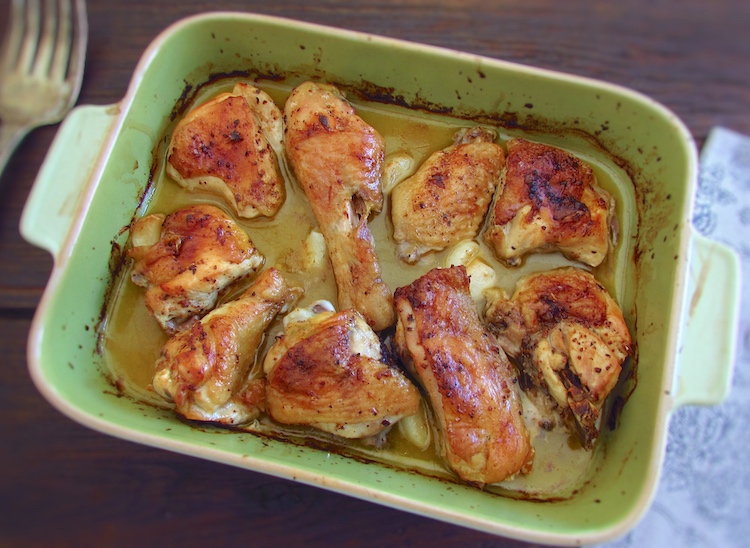 Baked chicken in the oven on a baking dish