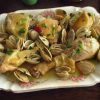 Chicken with clams on a platter