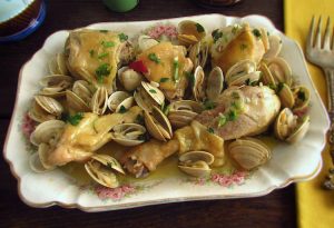 Chicken with clams on a platter