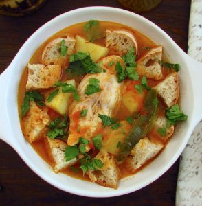 Tomato soup with snapper on a dish