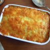 Cod with mayonnaise on a baking dish