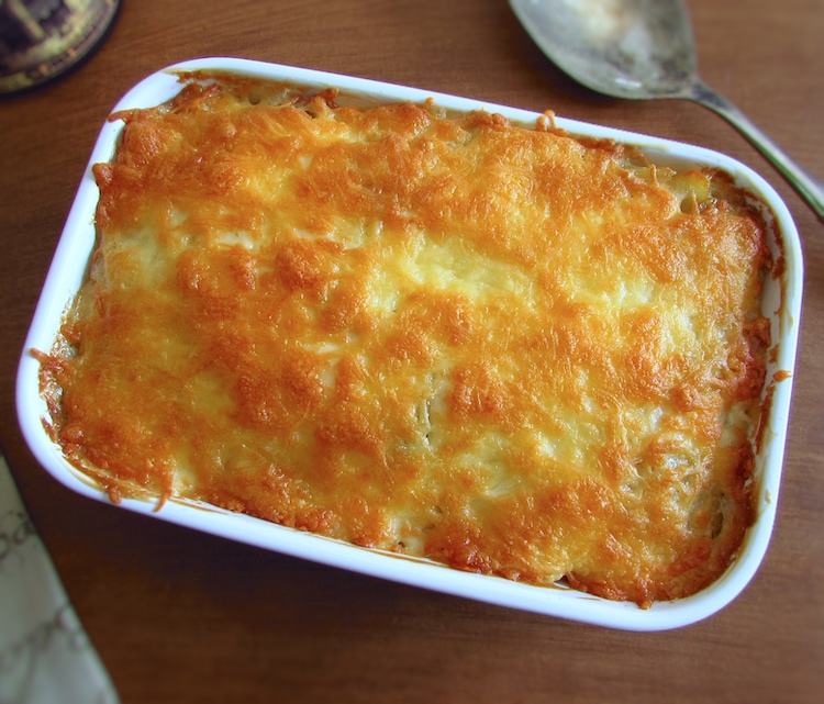 Cod with mayonnaise on a baking dish