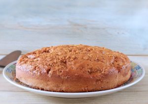 Apple, pineapple and cinnamon cake on a plate