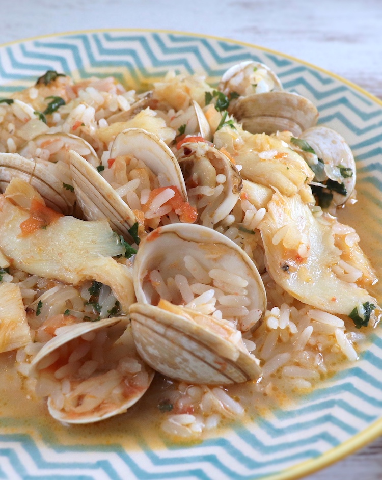 Cod rice with clams on a plate