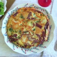 Spanish omelette with meat on a plate