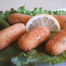 Cod croquettes with lettuce on a plate
