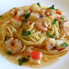Spaghetti with shrimps and seafood delights on a plate