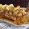 Stewed pork loin with lemon and honey on a platter