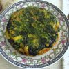 Spanish omelette with spinach on a plate