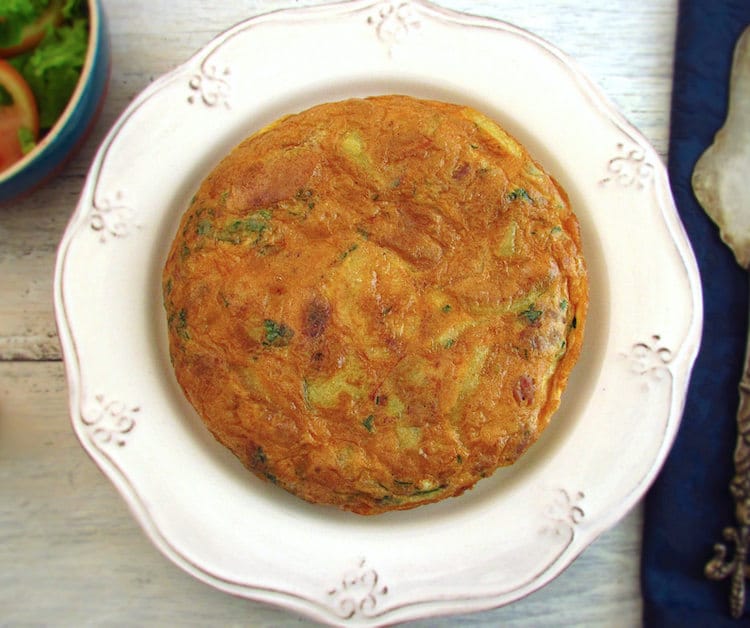 Spanish omelette with potato and tuna on a plate