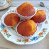 Orange and vanilla muffins on a plate