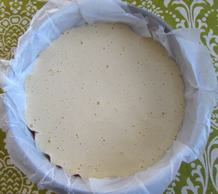 Portuguese sponge cake dough on a round cake pan