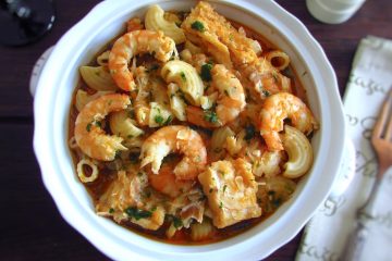 Pasta with cod and shrimp on a tureen