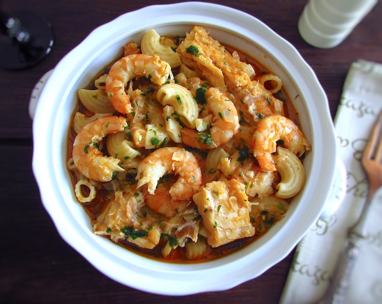 Pasta with cod and shrimp on a tureen