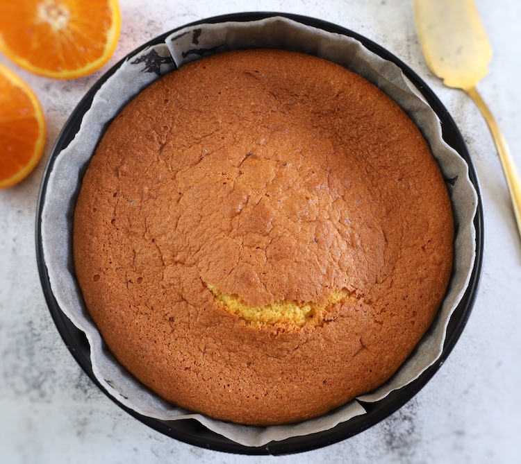 Orange Sponge Cake in a round cake pan