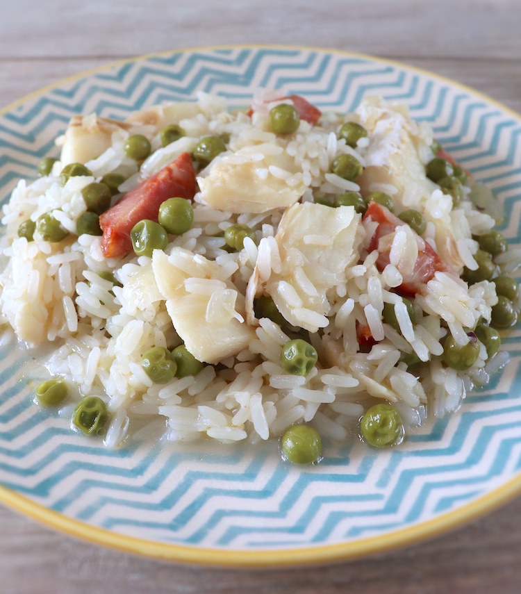 Salt cod rice and peas on a plate