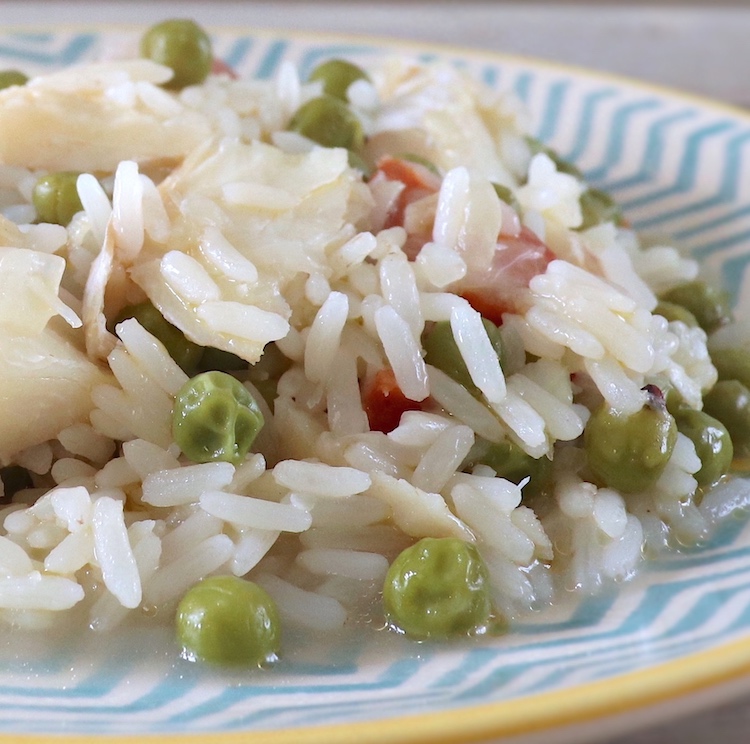 Salt cod rice and peas on a plate