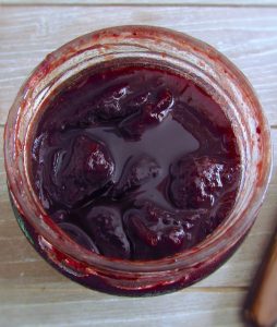 Plum jam on a glass jar