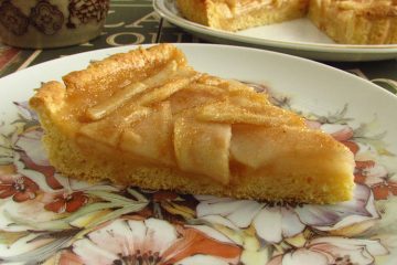 Pear and honey pie slice on a plate