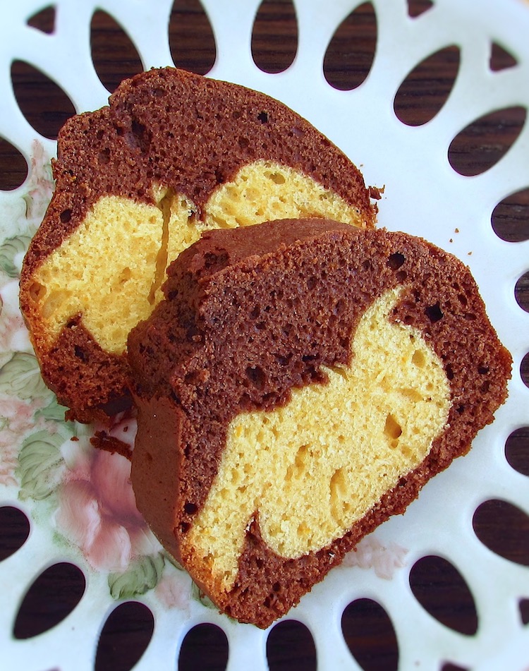 Slices of chocolate orange marble cake on a plate