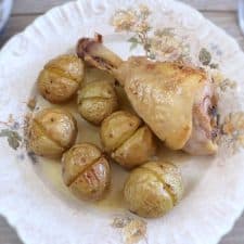 Chicken with roasted potatoes on a plate