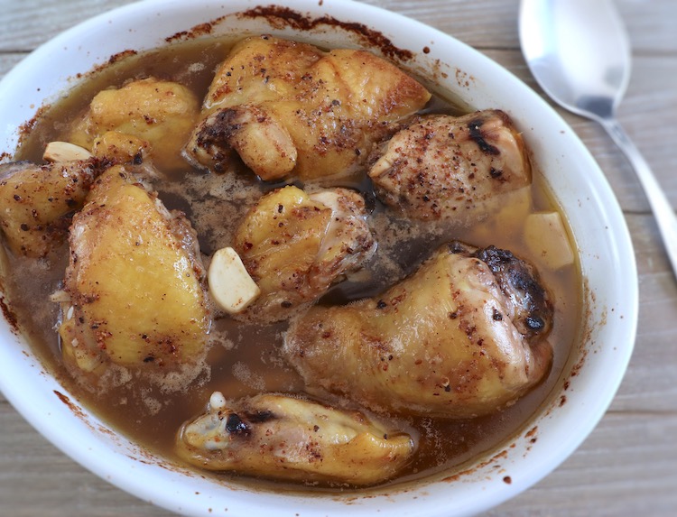 Chicken in the oven on a baking dish