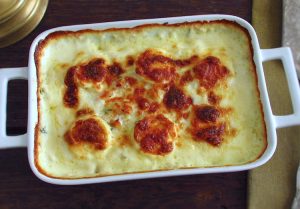 Cod in the oven with egg and béchamel on a baking dish