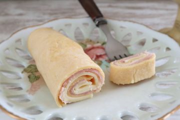 Crepe with ham and cheese on a plate