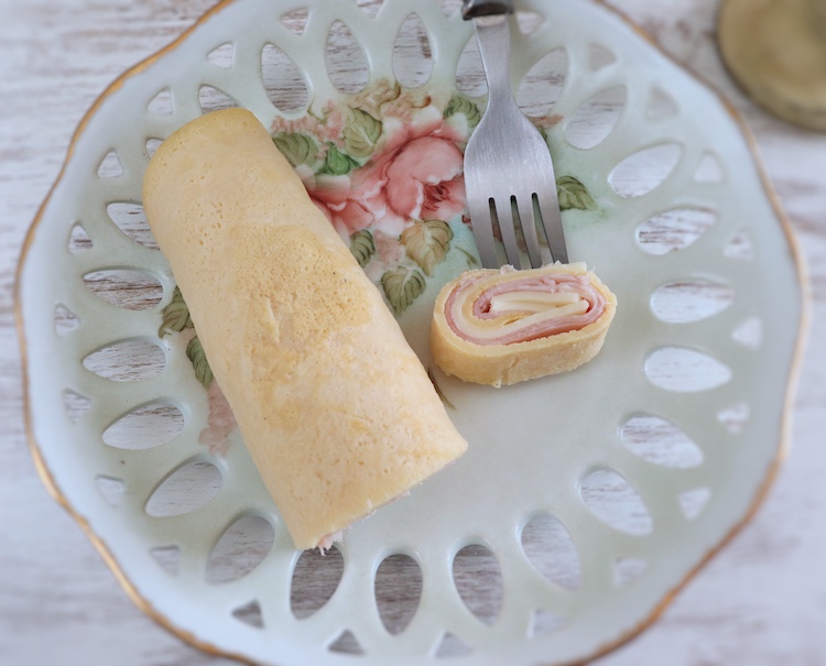 Crepe with ham and cheese on a plate