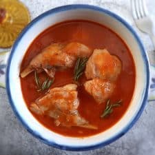 Rabbit in tomato sauce on a tureen