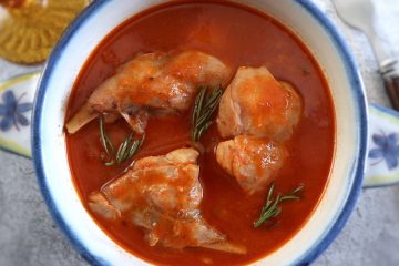 Rabbit in tomato sauce on a tureen