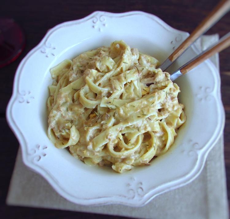 Tagliatelle with tuna and egg on a dish bowl